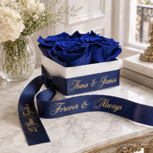 Blue preserved rose box with personalised satin ribbon and gold lettering